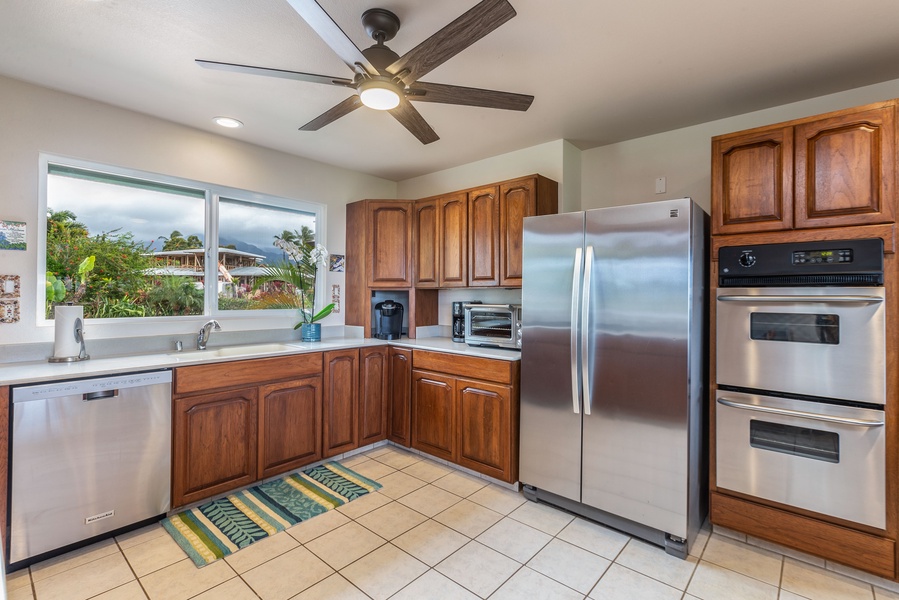 The spacious kitchen offers the perfect space to cook a delicious meal