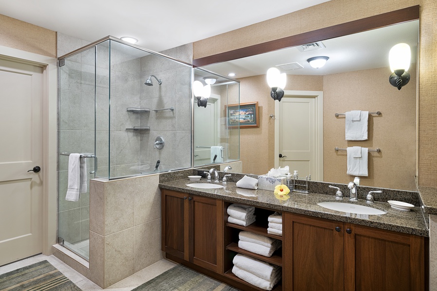 Dual vanities and walk-in shower featured in the Primary Bath