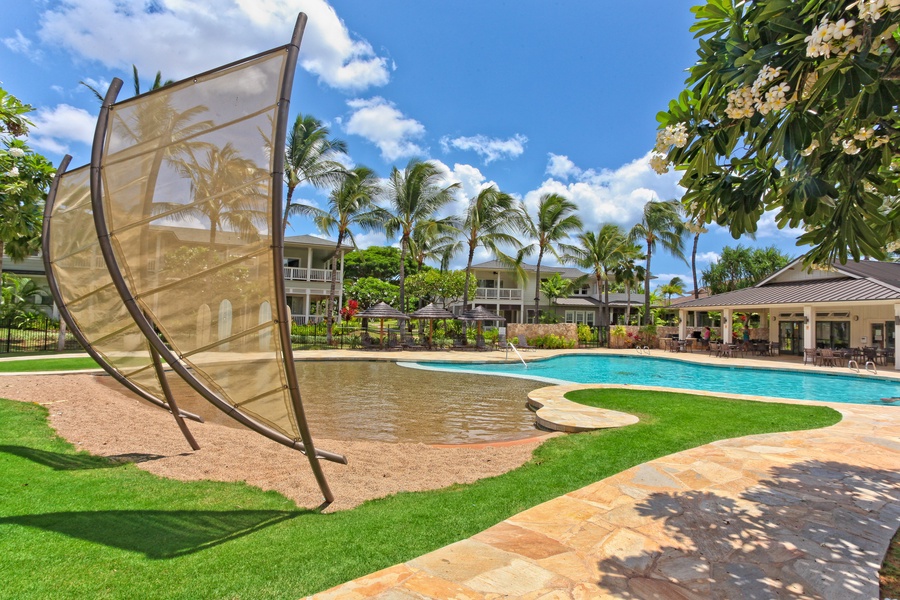 Go for a swim in the sparkling waters and rest in the lounge chairs at the community pool.