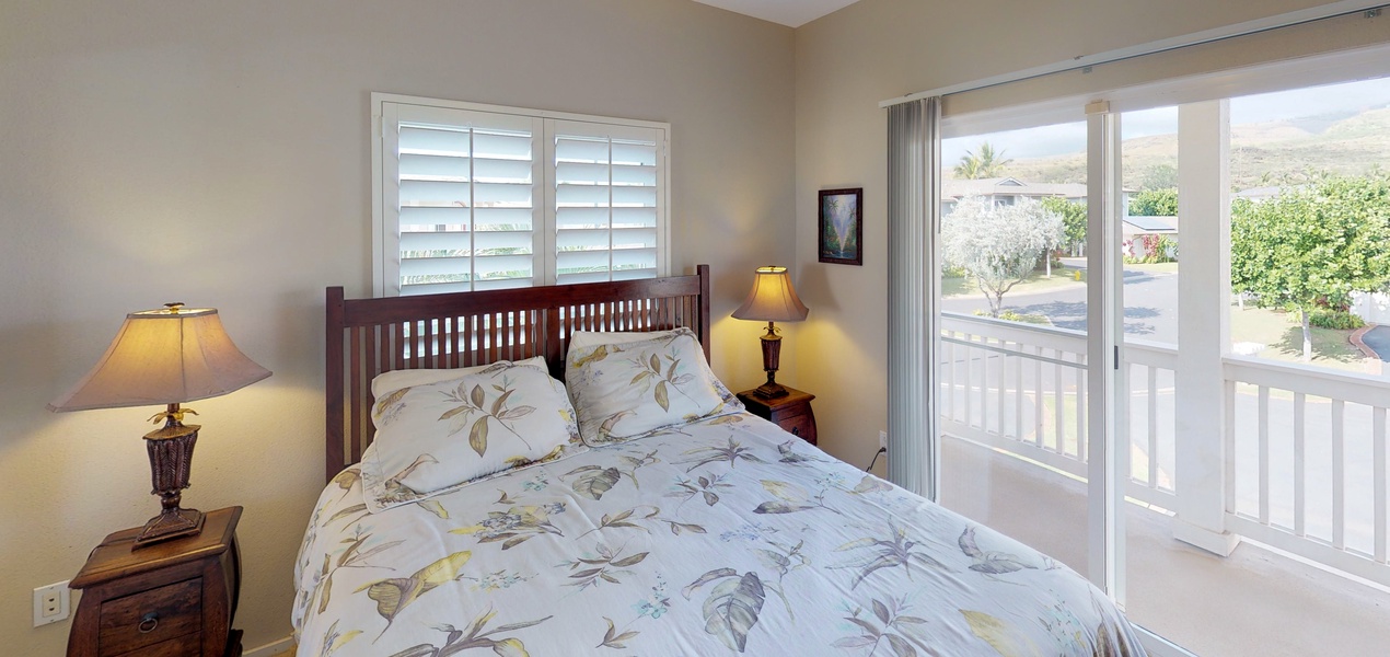 The second guest bedroom with private lanai access.