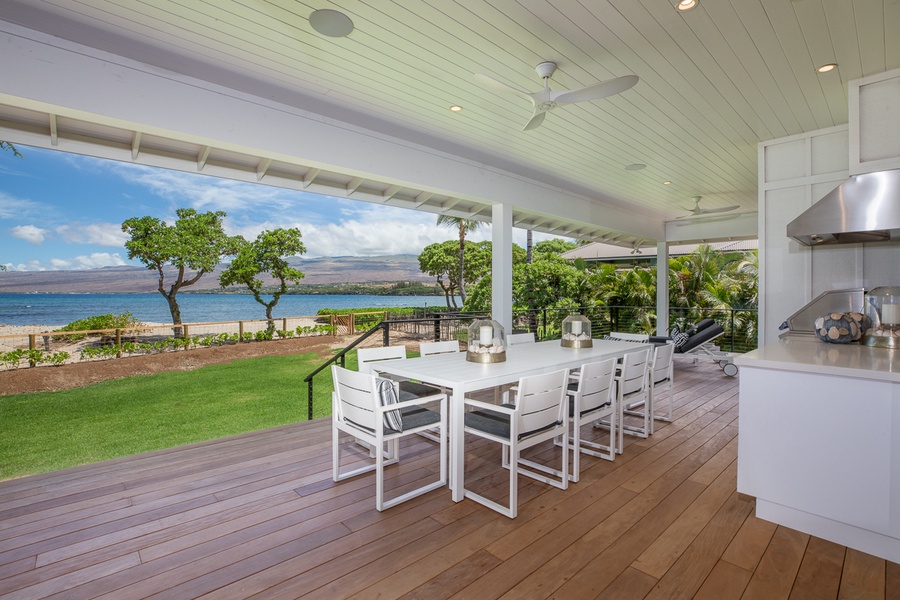 Relax in the shade on the oceanfront lanai, where you can enjoy peaceful mornings and spectacular sunsets.