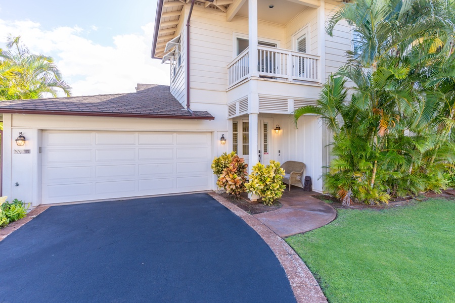 The paved area and garage at the home.