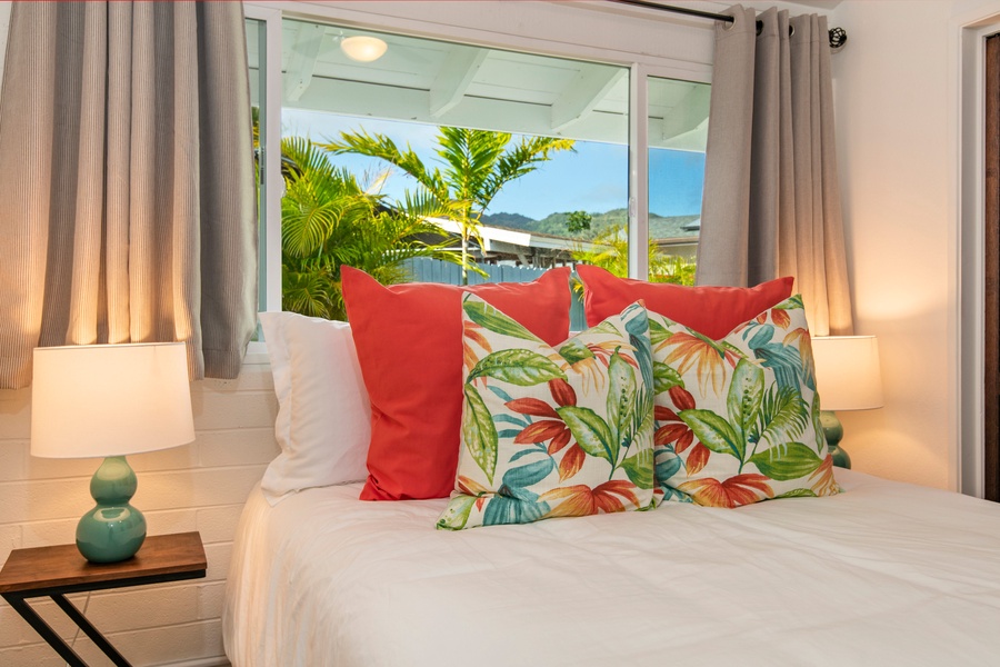 Bedroom 2 - Queen bed, split ac with back yard garden and jacuzzi views.