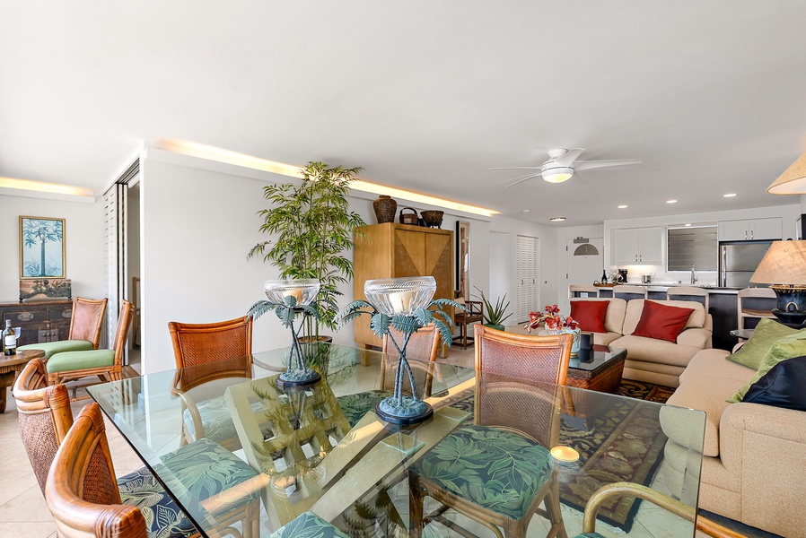 Gather at the glass-top dining table for meals with a view, whether it's a sunrise breakfast or a celebratory dinner after a day of island adventures.