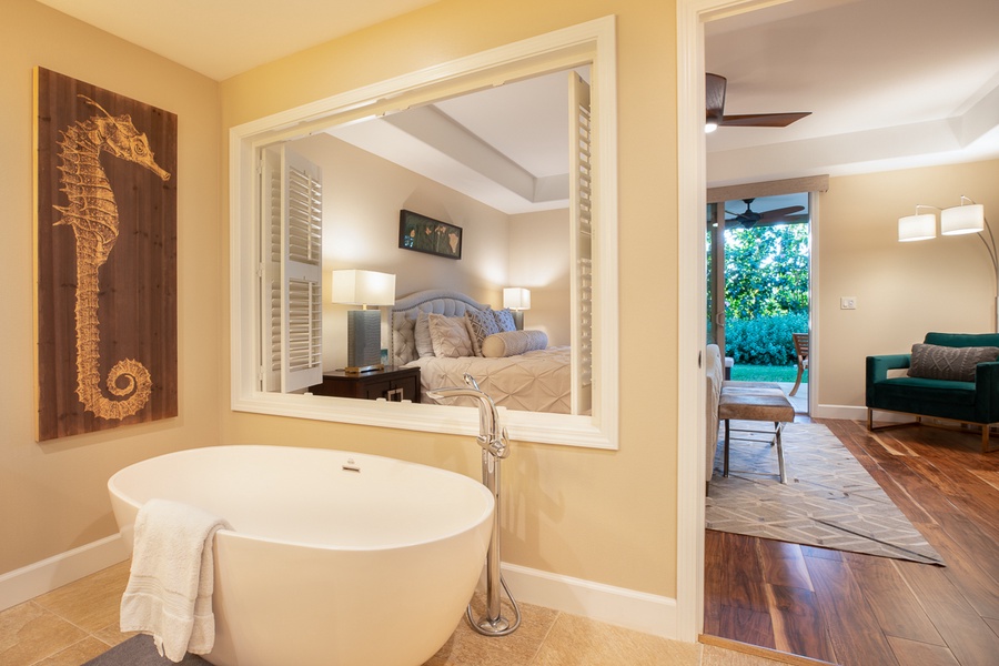 En-suite soaking tub with privacy shutters that can be closed for the ultimate get away or slid open to relax while enjoying the beautiful outdoor views.