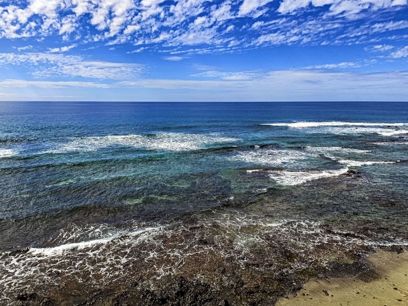Explore the wide shoreline, ideal for peaceful walks in the natural beauty of the coast.