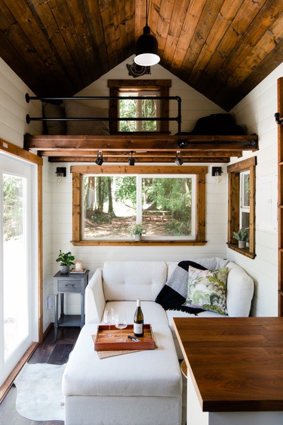 Lofted ceiling and bright windows make for a large feeling space.