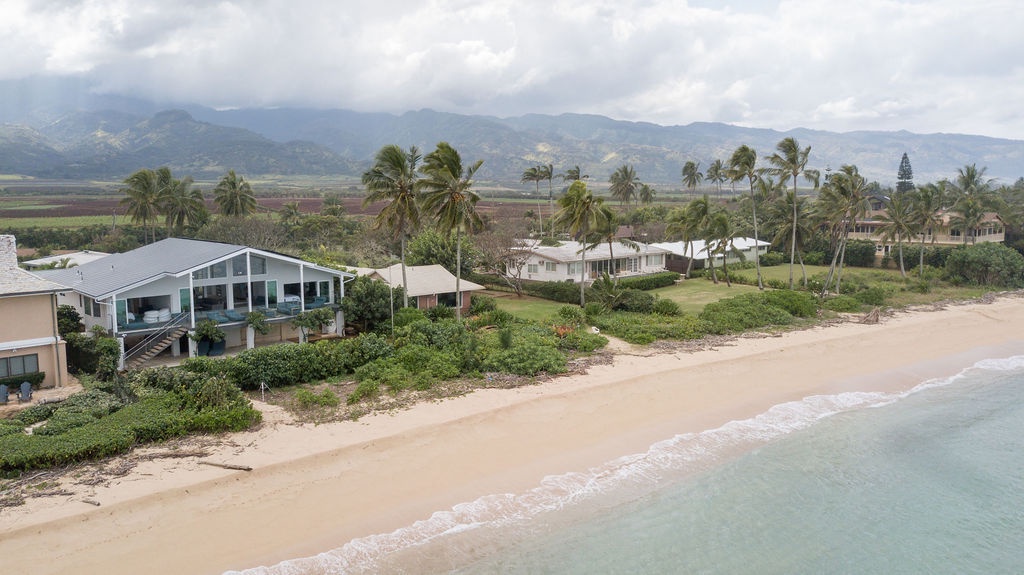 Aerial shot of property and surrounding neighborhood