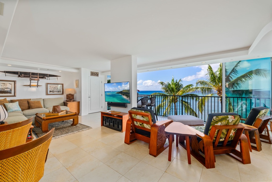 Inviting indoor-outdoor dining area with ocean views and cozy seating—perfect for meals or relaxation with a stunning backdrop