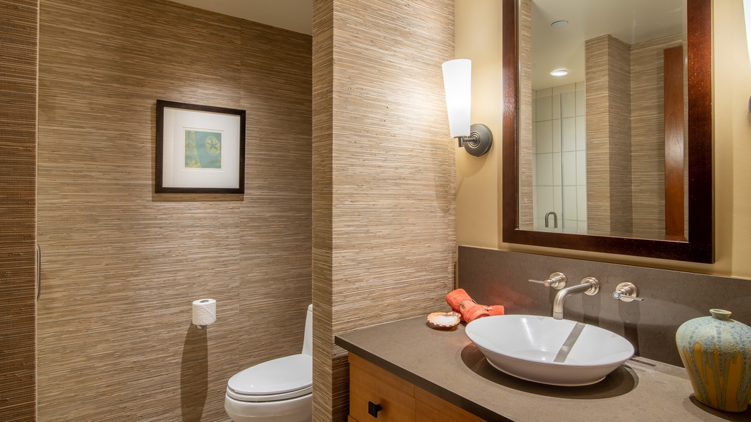 The second guest bath is a full bathroom with a walk- in shower.