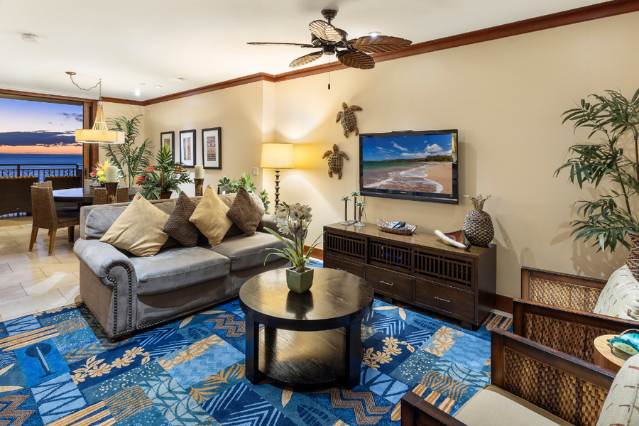 Sink into the plush seating in the living area after a fun day at the beach.