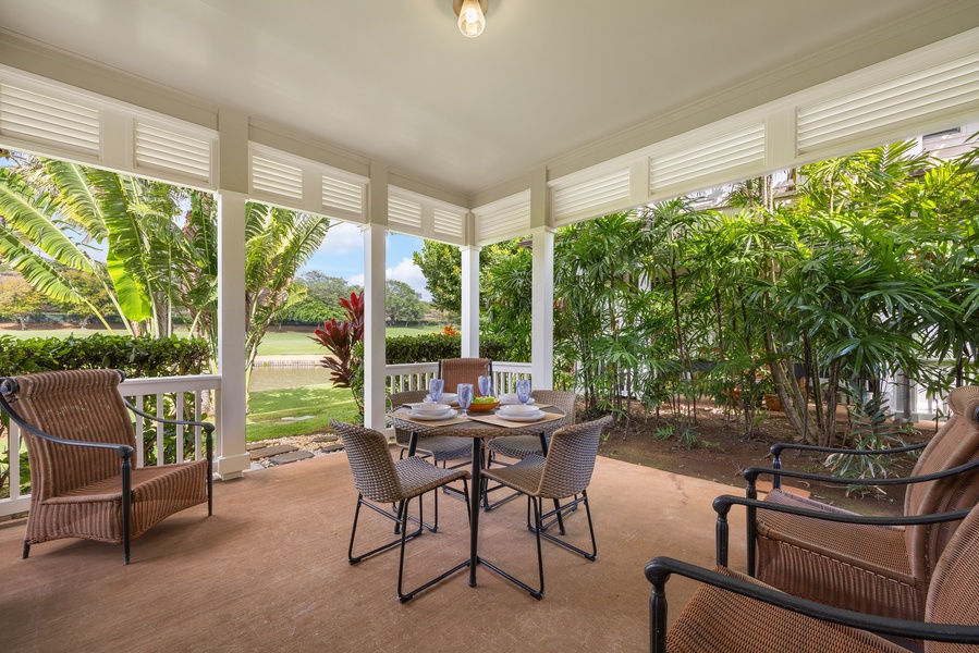 Your private covered terrace offers tropical garden views and perfect dining space surrounded by lush greenery.