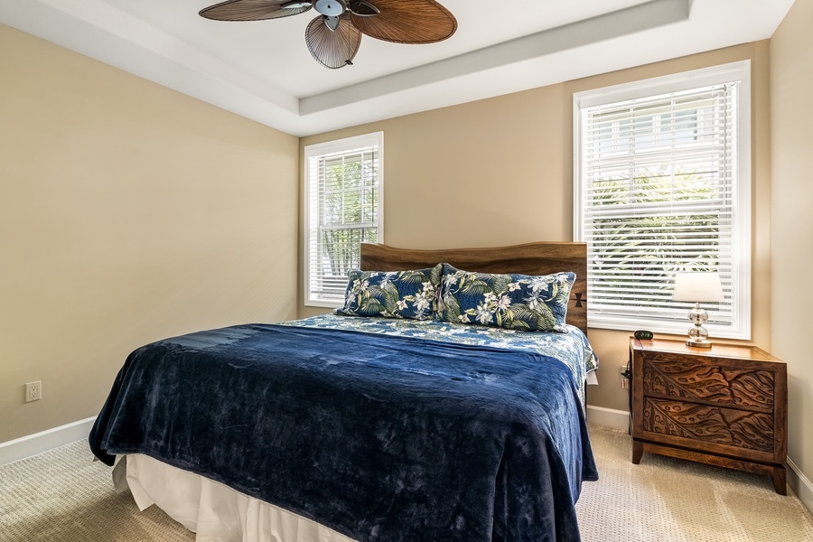 Guest bedroom equipped with King bed, A/C, and TV