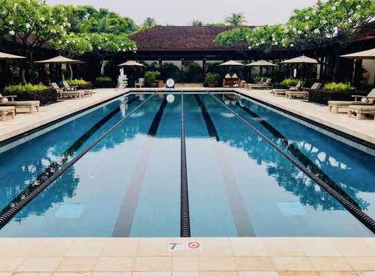 Four Seasons Resort has an expansive lap pool with lounging areas.