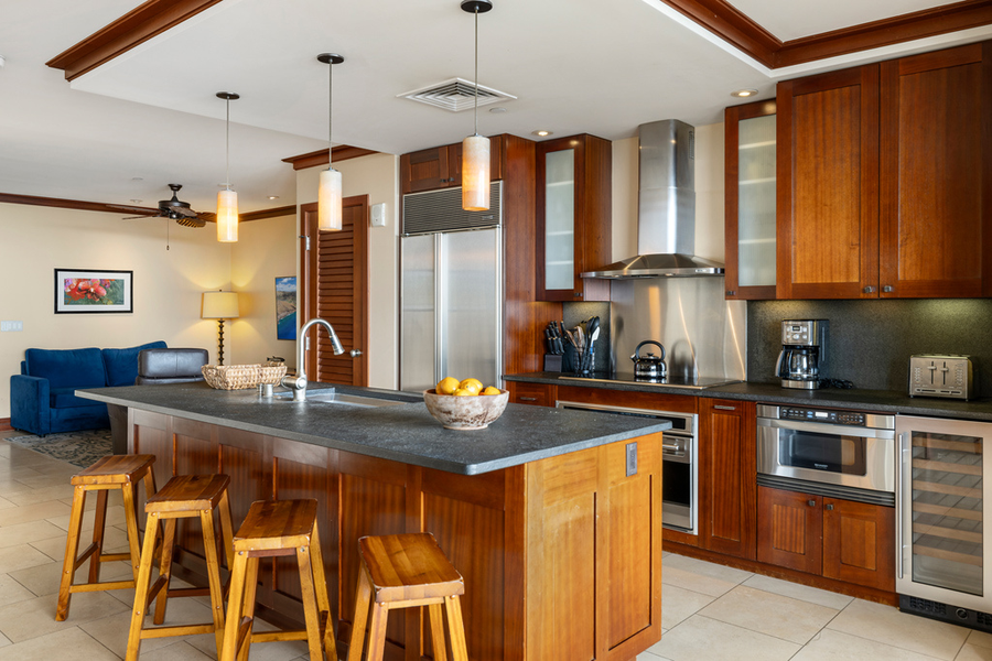 Meal preparation is a pleasure with modern kitchen and large island space.