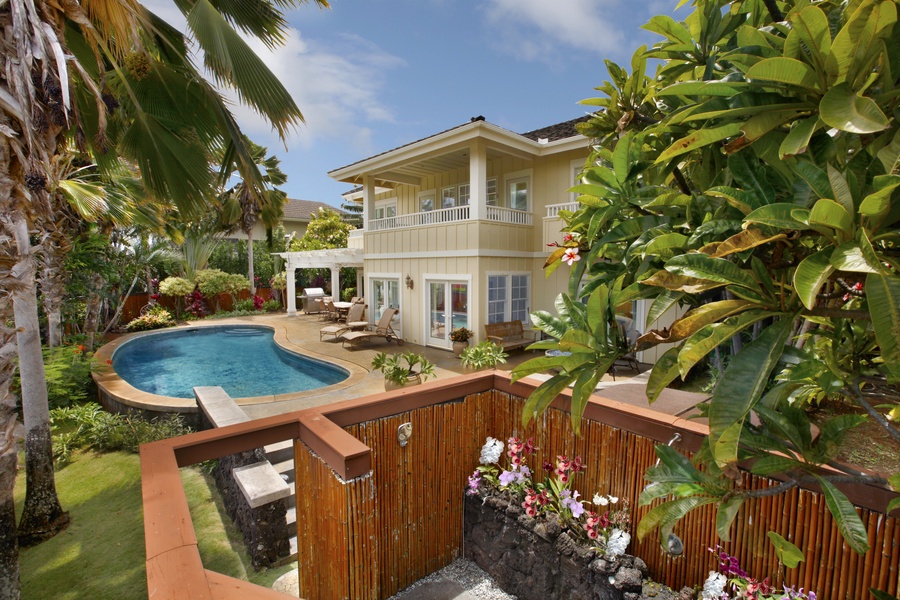 Backyard with pool, spa and outdoor lava rock shower