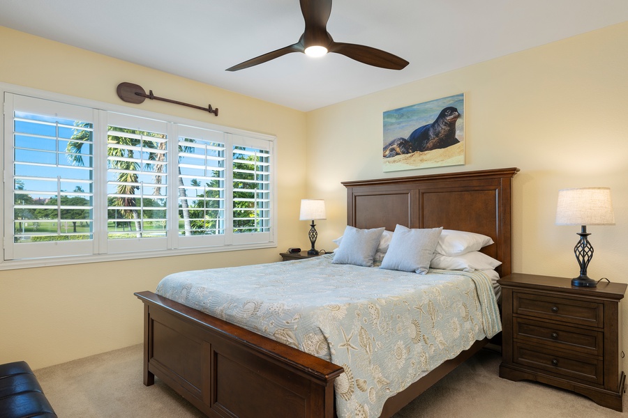 The Primary bedroom offers charming decor for a restful stay