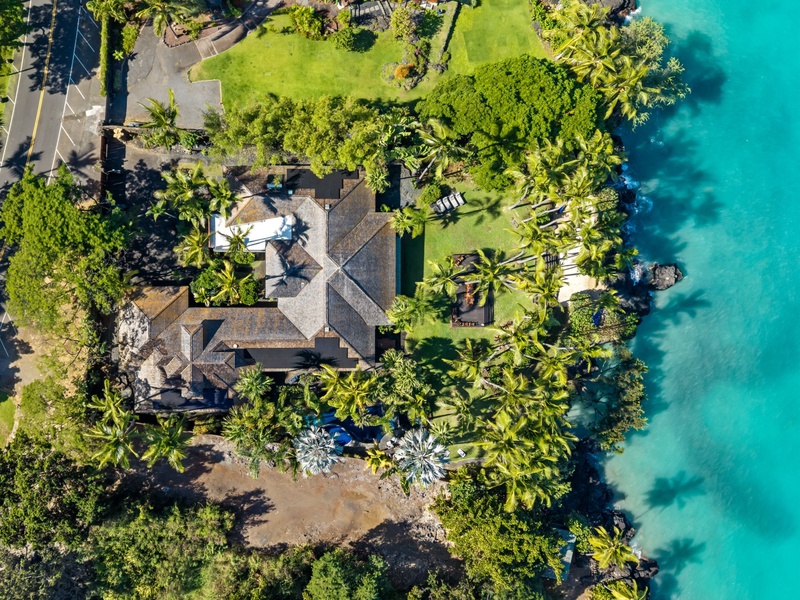 Stunning beachfront property nestled between lush tropical gardens and pristine turquoise waters, offering the perfect island escape.