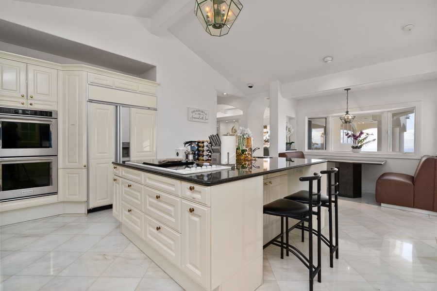 Kitchen with white cabinetry to keep your essentials.