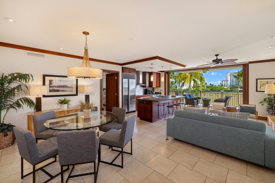 Your elegant open-plan retreat features modern furnishings, a fully equipped kitchen, and tropical views that invite you to unwind in style.