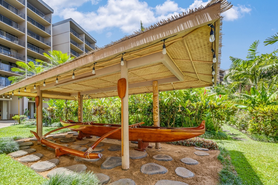 Traditional Hawaiian canoe displayed at Kaanapali Shores resort grounds.