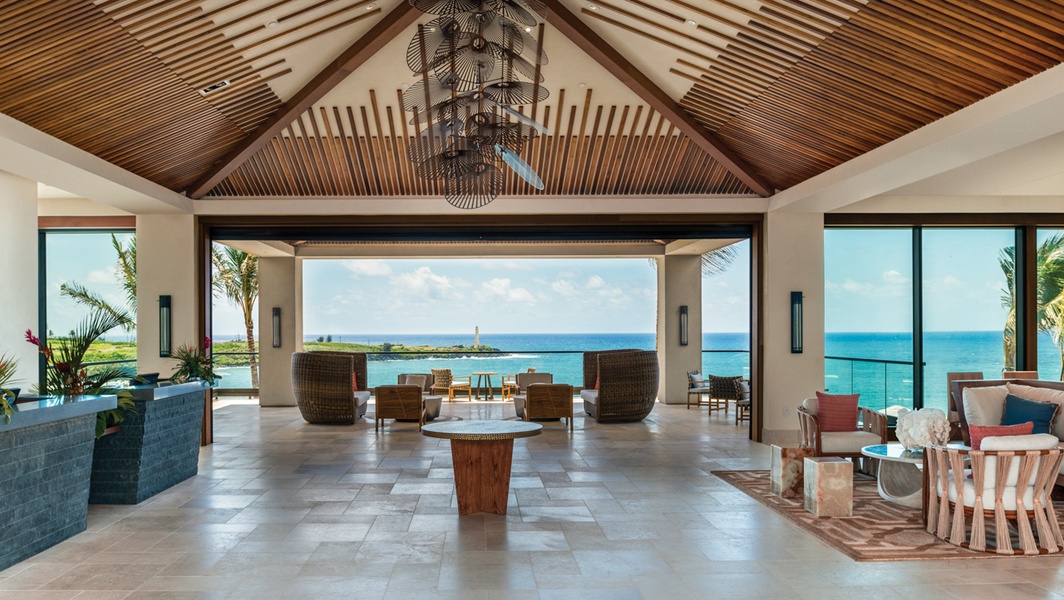 A grand, ocean-view lobby greets you upon arrival.