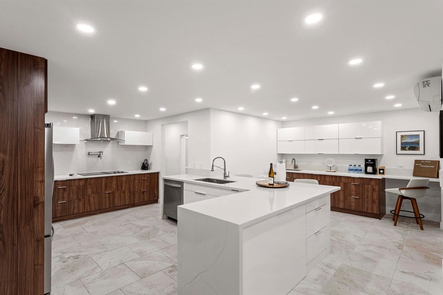 A roomy kitchen area is a chef’s delight—modern fixtures meet home-style warmth.