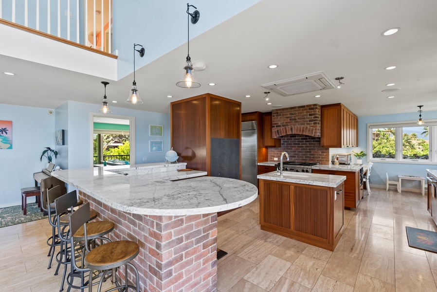 Generously sized kitchen with island and bar seating