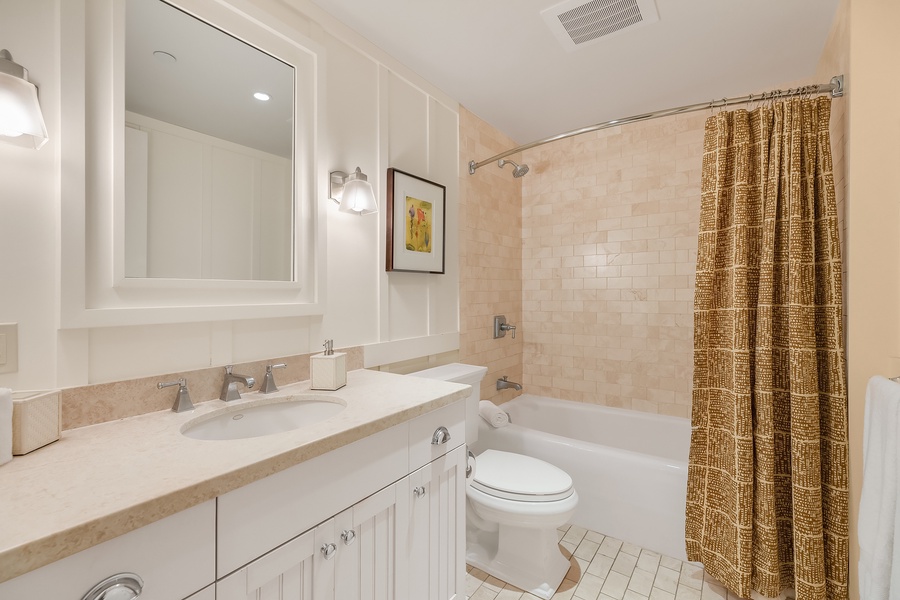 Guest bathroom with tub