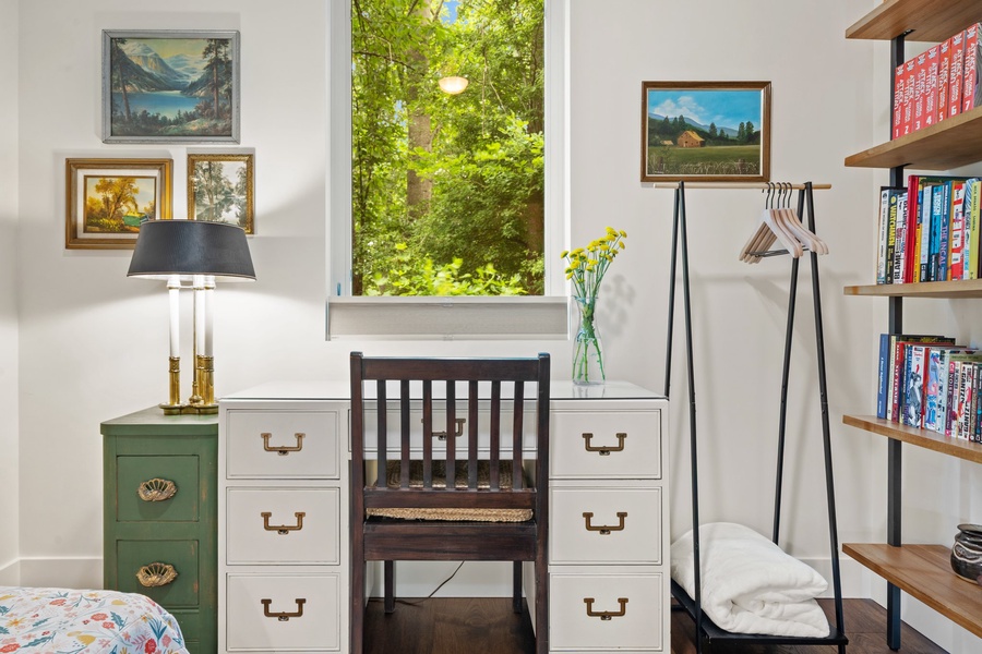 Treetop views and eclectic decor make this a fun space to rest or read.