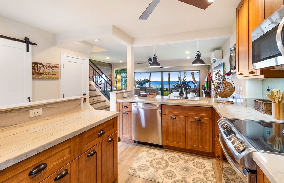 Sleek countertops and ample prep space in a beautifully updated kitchen, ideal for your culinary creations.