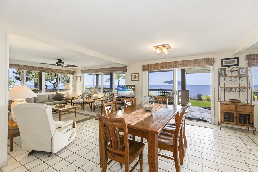 Dining area with table for six with open views to the ocean.