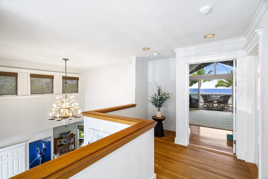 Upstairs landing opens directly into the luxurious primary suite.