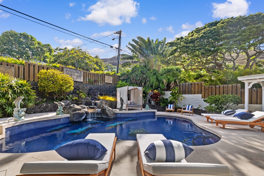 The cozy cabana by the pool is an added touch of privacy and relaxation.