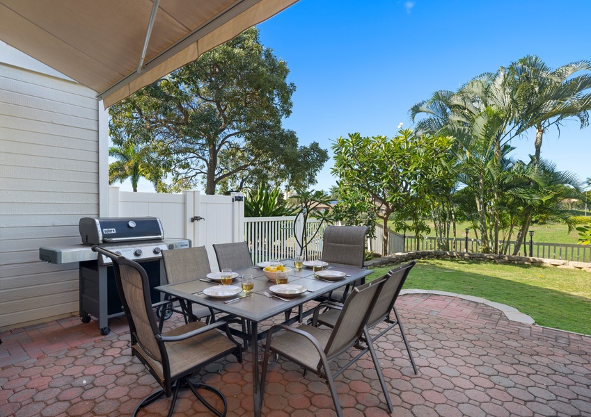 Enjoy outdoor dining on the patio with a BBQ grill and golf course views.