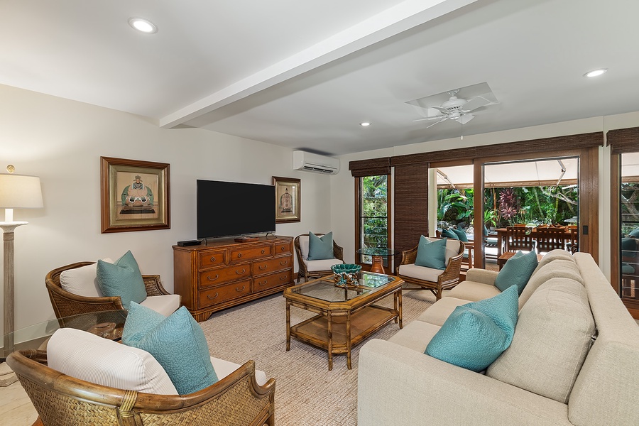 Den and living area, offering a cozy space for relaxation or entertainment.