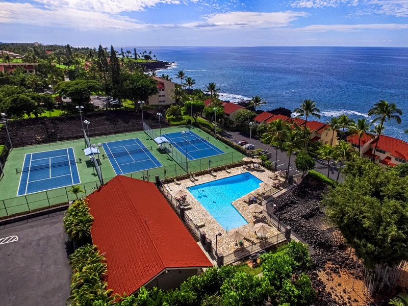 Enjoy exclusive access to the vibrant condo clubhouse, complete with tennis courts for a friendly match, a ping pong table for indoor fun, and a sparkling pool for a refreshing swim.
