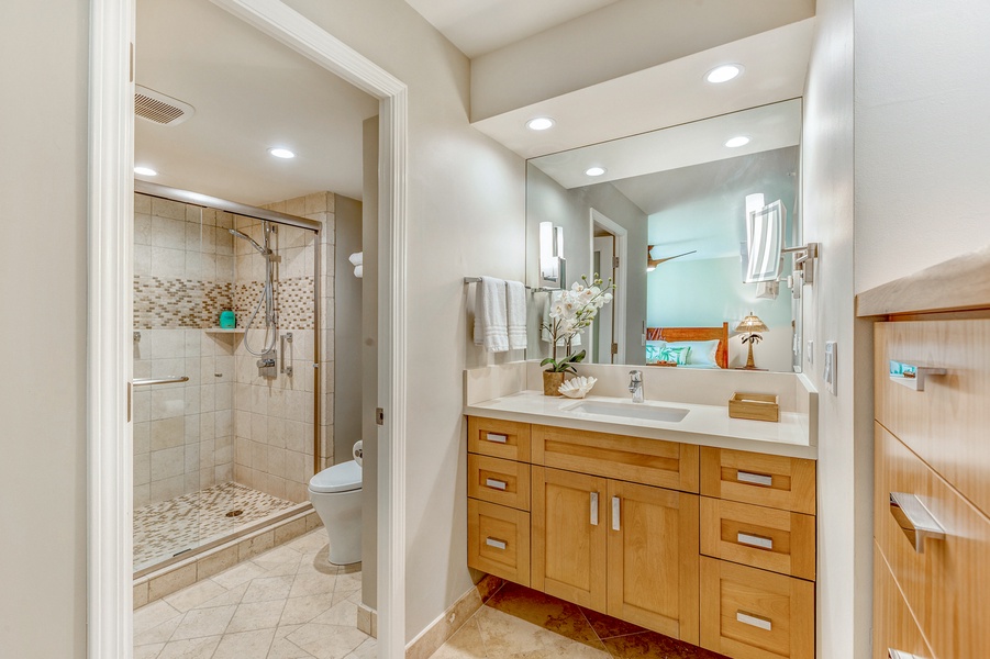 Mahana 1119 ensuite with walk-in shower and single vanity perfect for a refreshing reset.