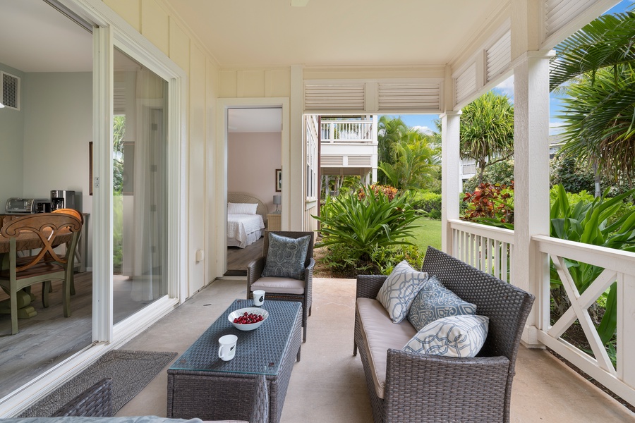 Cozy lanai retreat with garden views and tropical breezes, perfect for morning coffee or pau hana.