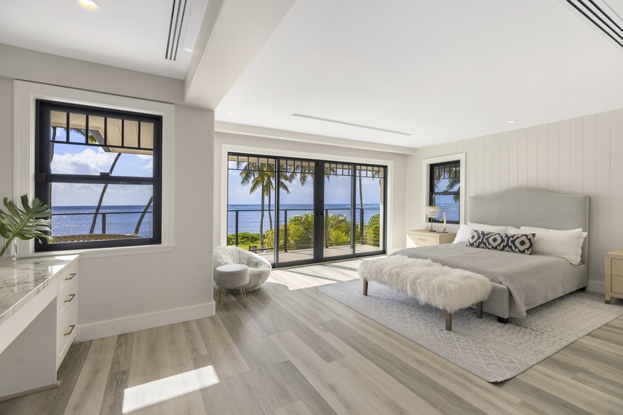 The primary bedroom comes with a comfy king bed, smart TV, private lanai with ocean views, and a gorgeous & spacious private ensuite