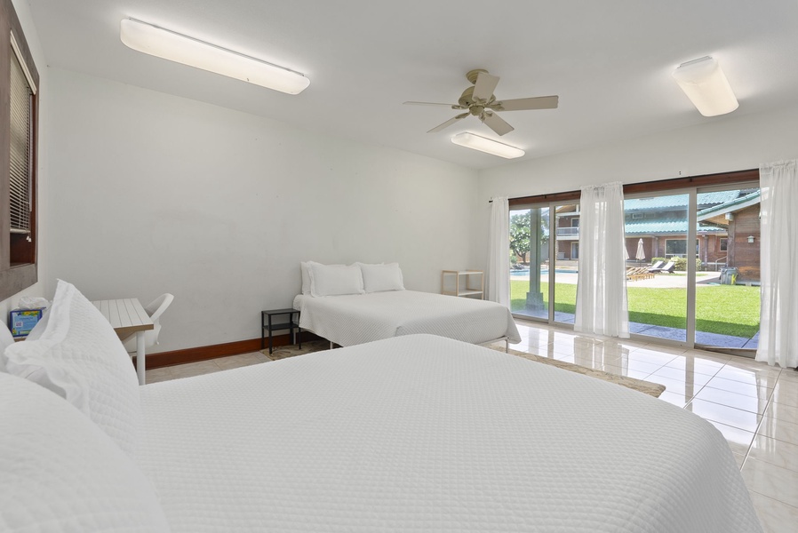 Comfortable guest bedroom with direct outdoor access.