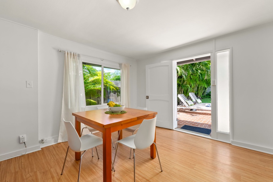 Picture yourself enjoying morning coffee at this charming dining table, then stepping through the glass doors to lounge by your private pool under swaying palms.