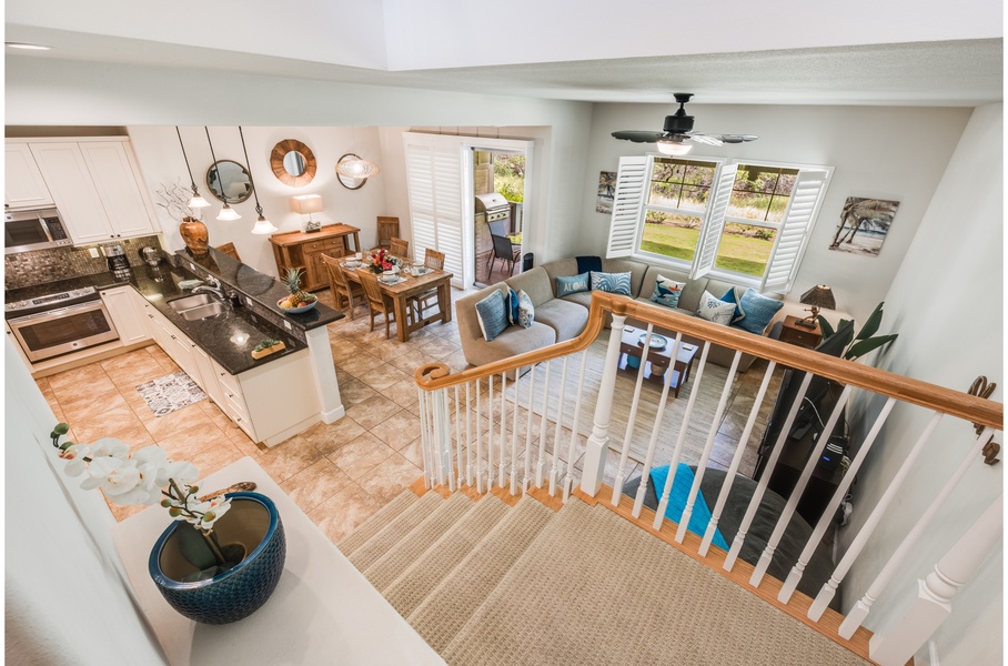 Open-plan living/dining area offers the ultimate in comfort and convenience, including a private lanai with gas grill, dining table and big comfy chairs