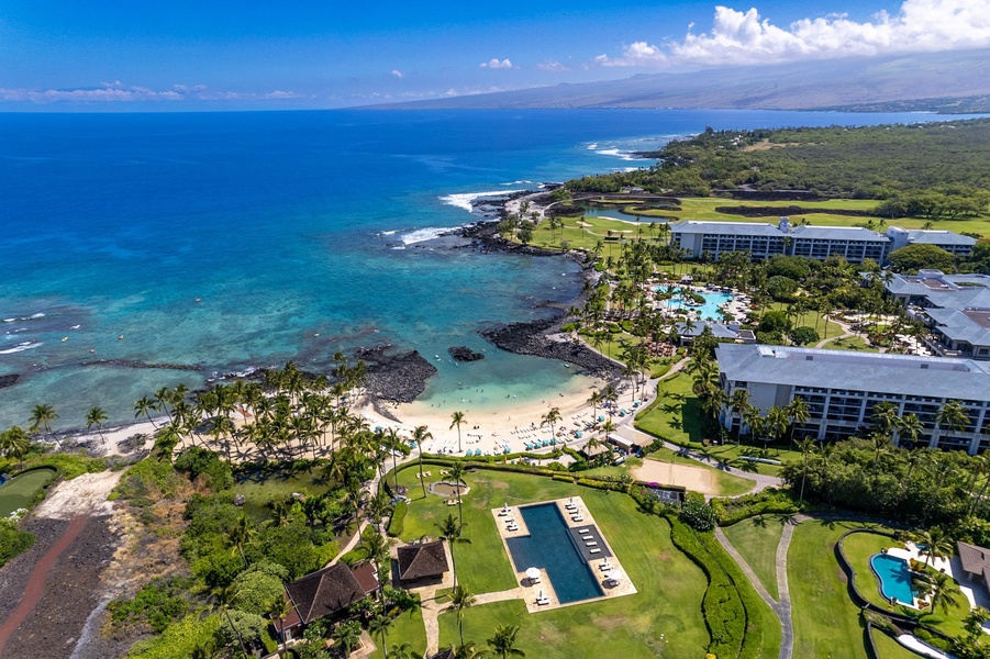 Aerial shot of the private Pauoa Beach Club and Fairmont Orchid Hotel