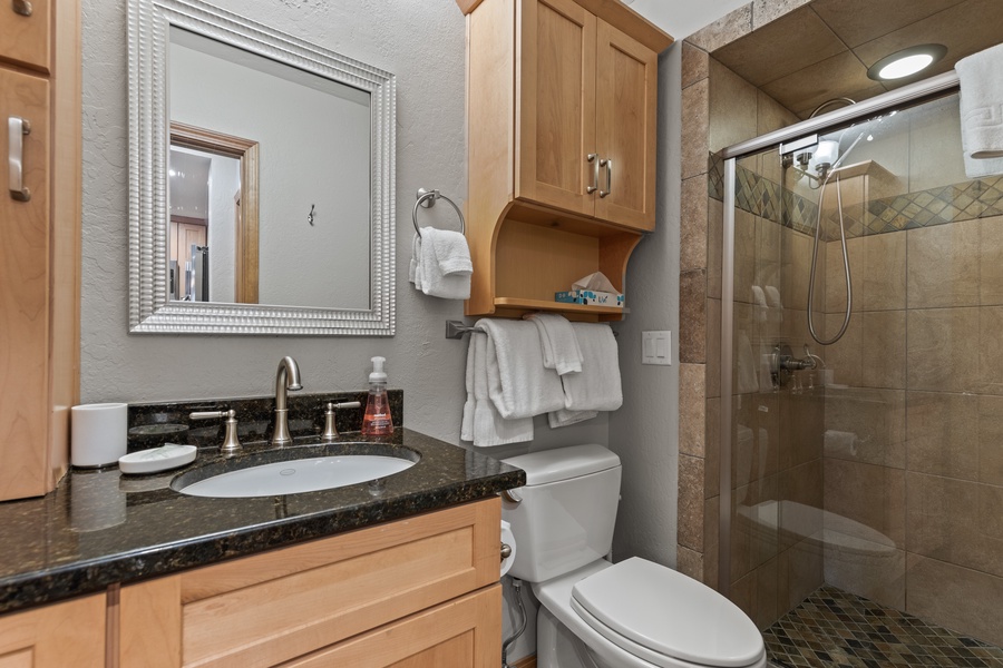 A comfortable shower in the second level full bathroom