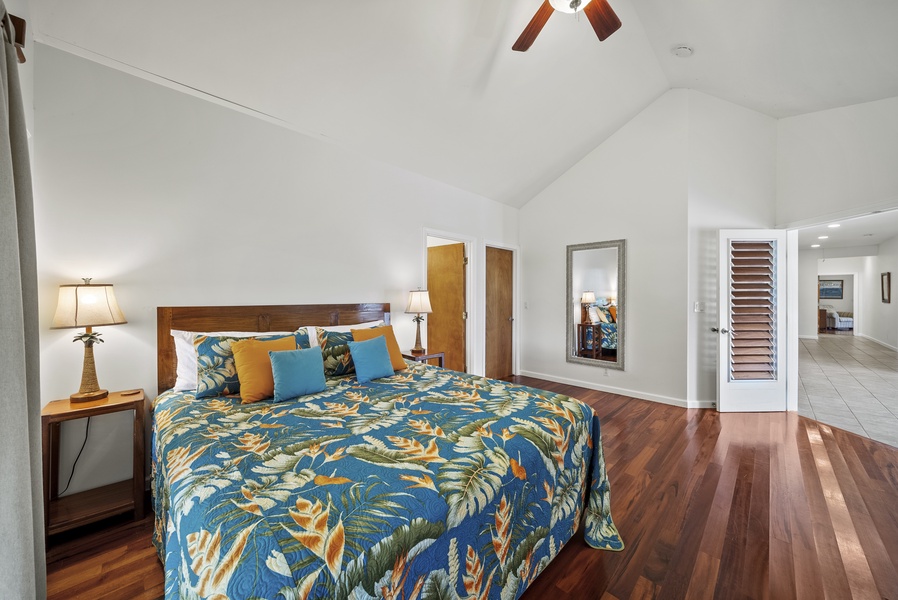 Alternate view of the main suite, featuring vaulted ceilings, rich textures, and tranquil ambiance for a restful night’s sleep.