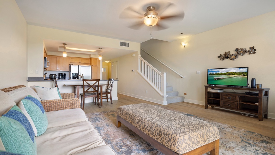 Enjoy a cozy ambiance and easy access to the upstairs retreat, with warm tones and comfortable furnishings throughout.