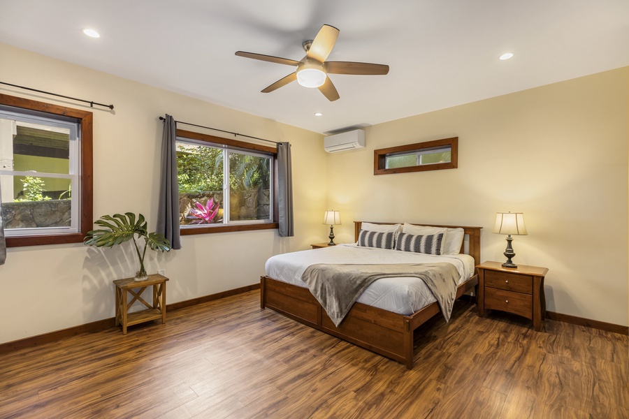 A fourth bedroom downstairs comes appointed with a king-size bed and split air conditioning.