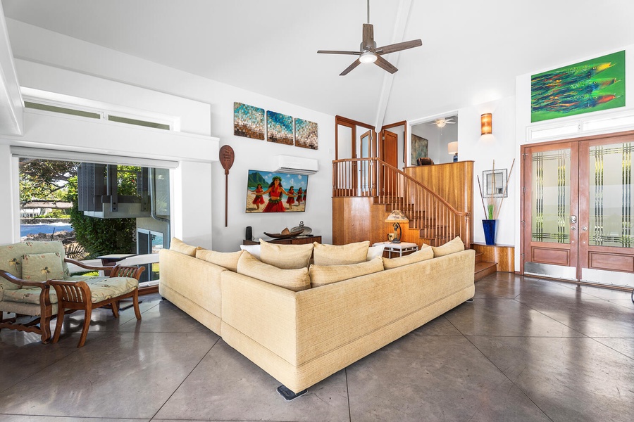Comfort meets connection in this oceanview living space—perfect for relaxing after a Kona beach day.