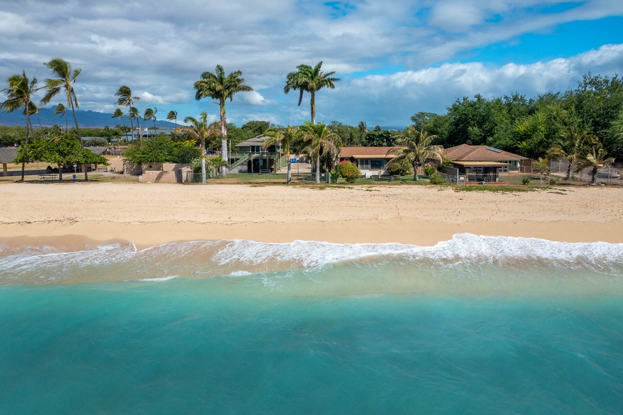 Indulge in the serene allure of the sea at this beachfront haven, where waves whisper the timeless tales of tranquility.